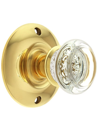 Large Brass Rosette Door Set with Round Glass Knobs in Lacquered Brass.